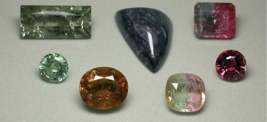 Specimens of tourmaline crystals in various shapes and colors